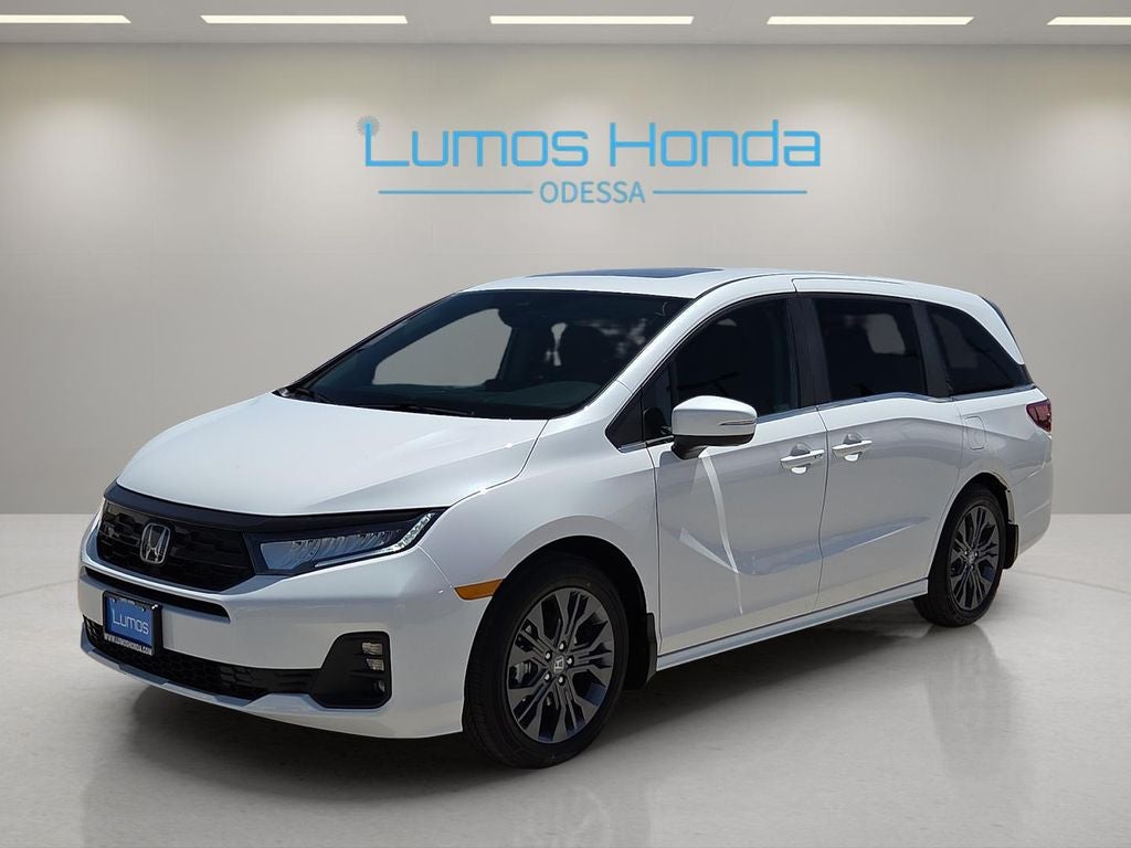 2026 Honda Odyssey Touring in Platinum White Pearl — front three-quarter view