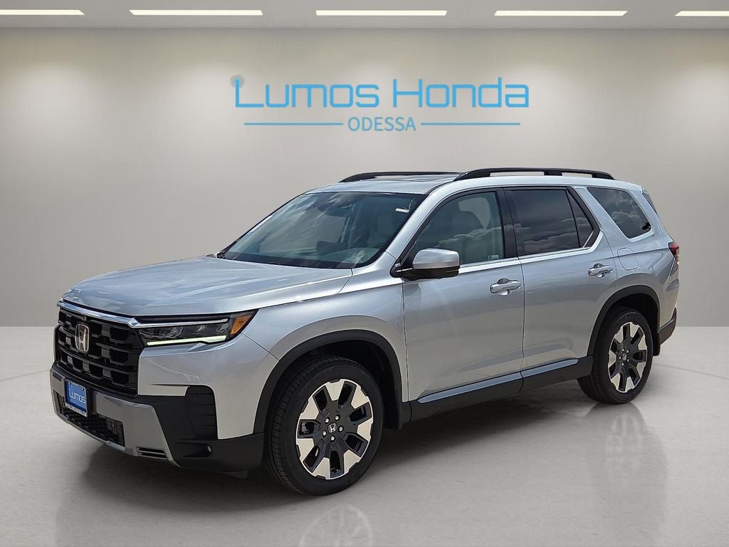 2026 Honda Pilot Touring in Solar Silver Metallic — front three-quarter view